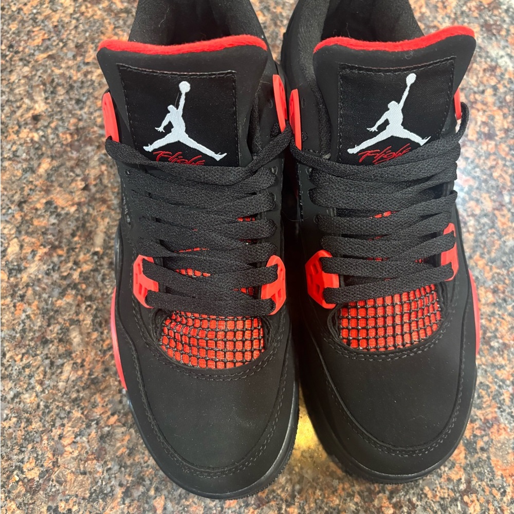 Air Jordan Black and Red Sneakers
